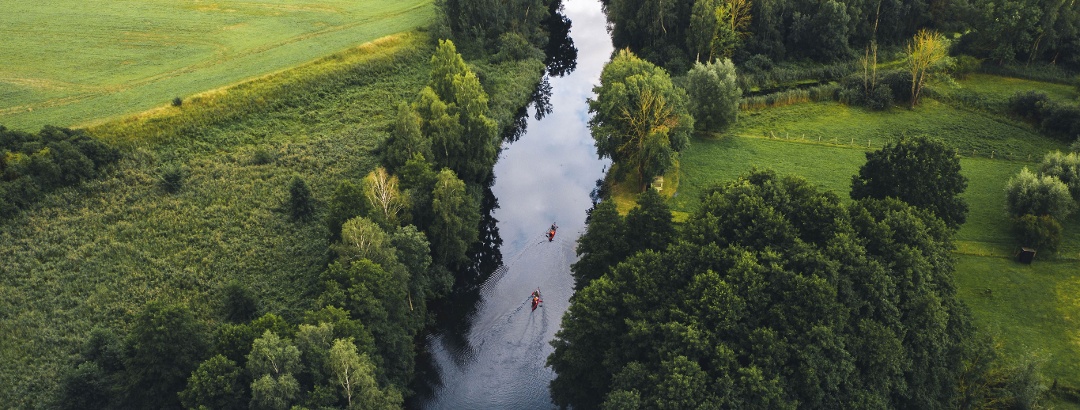 With the canoe on the river Elde